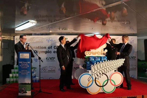 Unveiling of the inaugural batch of Cowala adult milk embossed with Olympic logo 